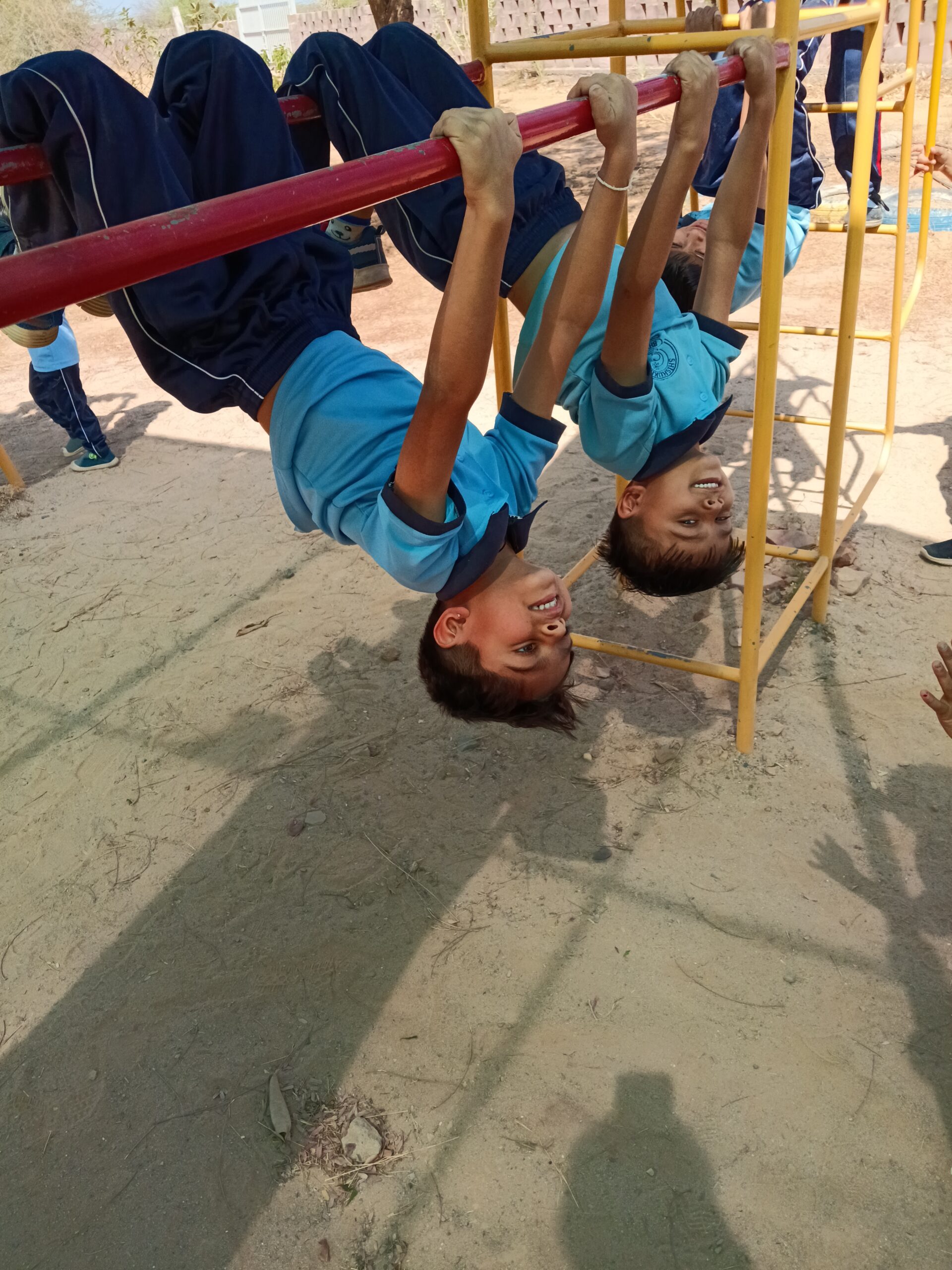 Children on parallel bars