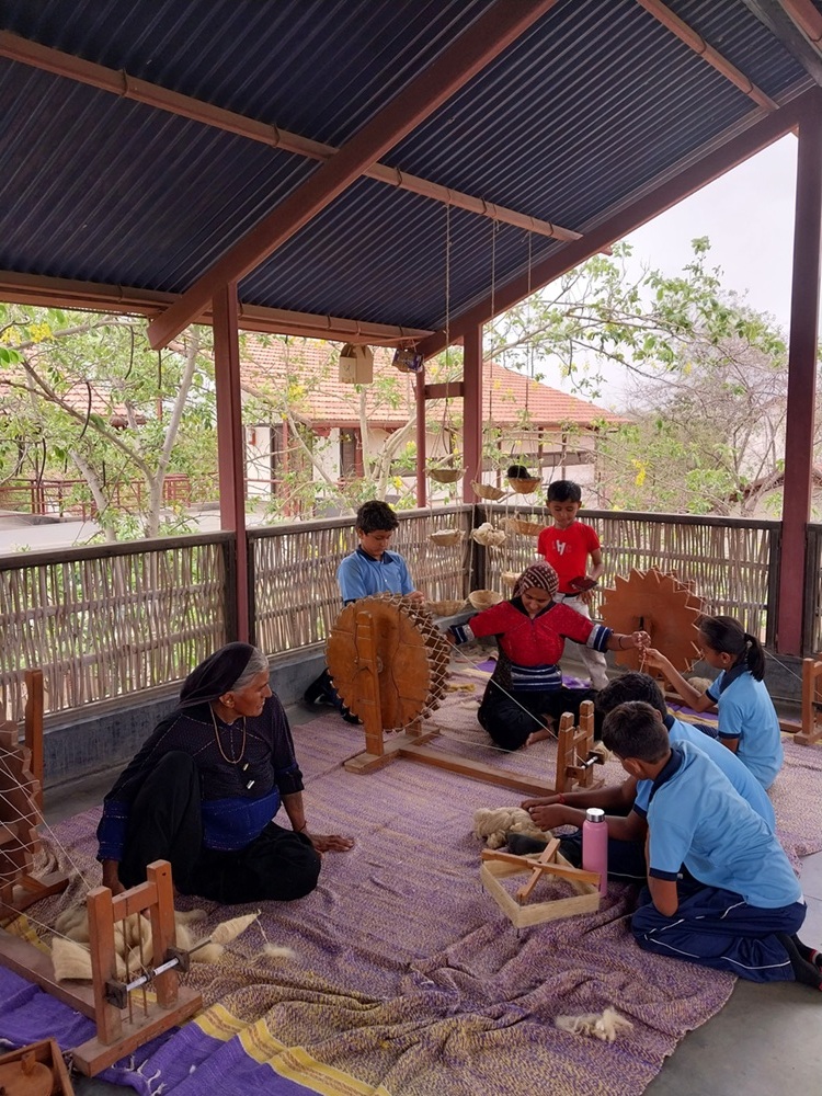 Spinning wool into yarn