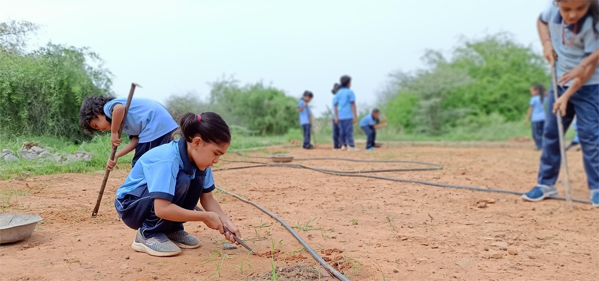 Young farmers tilling the land