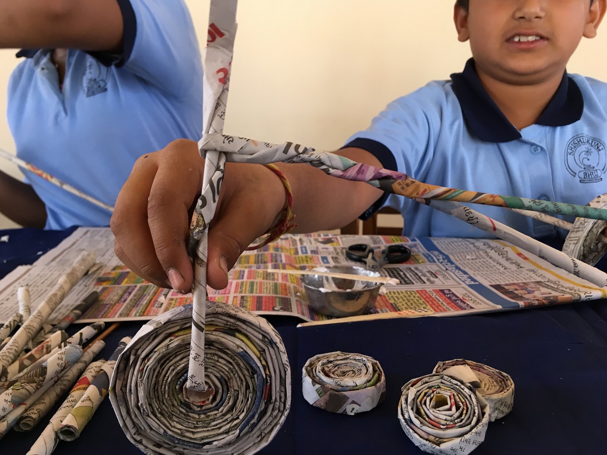 Rolling newspapers